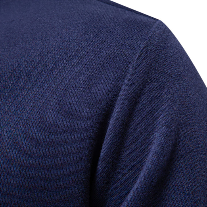 Man wearing a stylish long sleeve polo pullover. Perfect for sophisticated casual wear & comfort.
