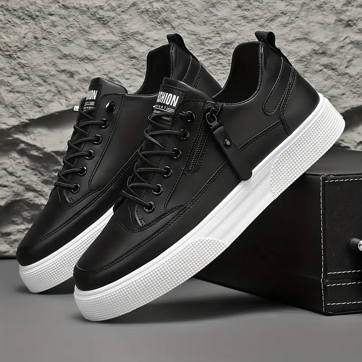 Men's modern side-zip sneakers for everyday style & comfort. Casual black or white footwear.