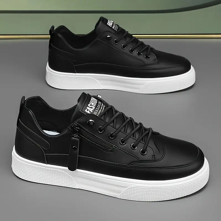 Stylish men's sneakers with practical side-zip closure for modern, comfortable everyday wear.