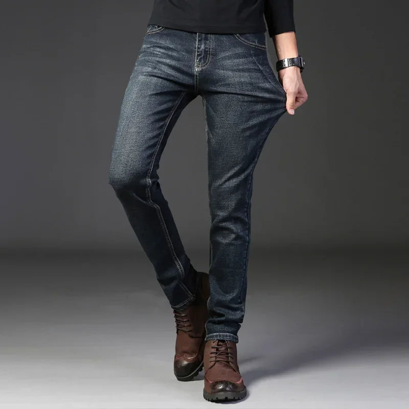 Comfortable men's washed slim fit jeans, ideal for all-day wear with a modern, stylish aesthetic.