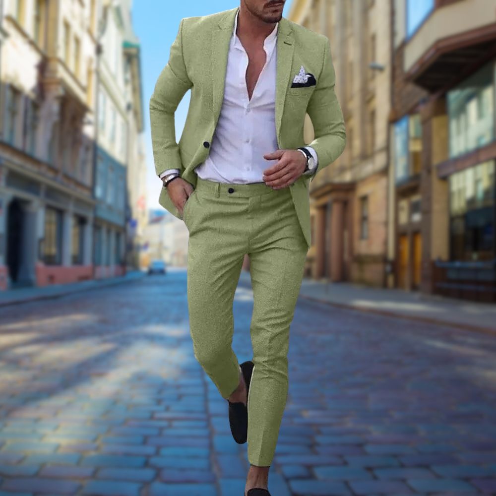 Man wearing a sharp, modern slim fit suit, showcasing its sleek silhouette. Perfect for formal events & business.