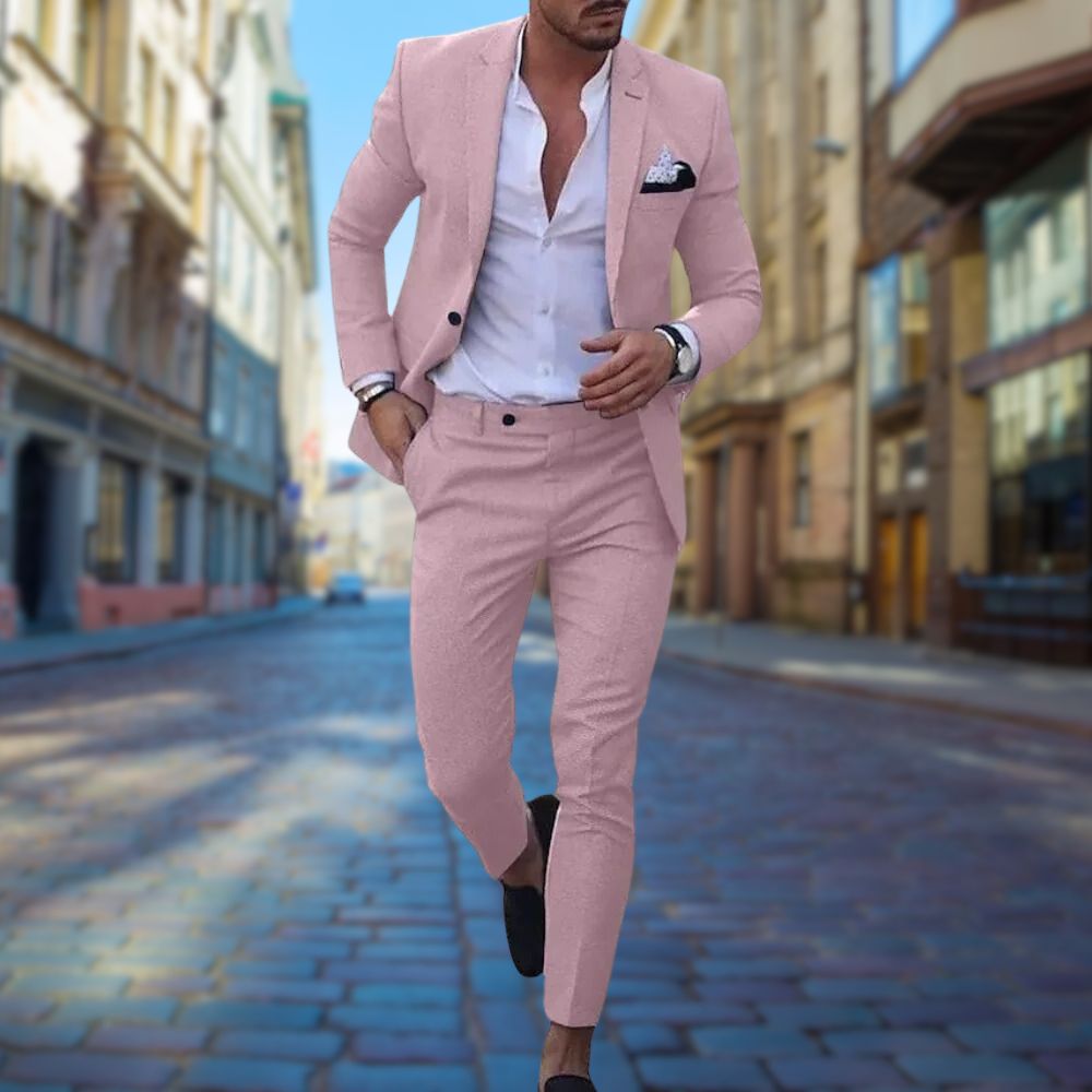 Stylish man in a modern slim fit suit, walking with confidence. Designed for all-day comfort at formal or business events.