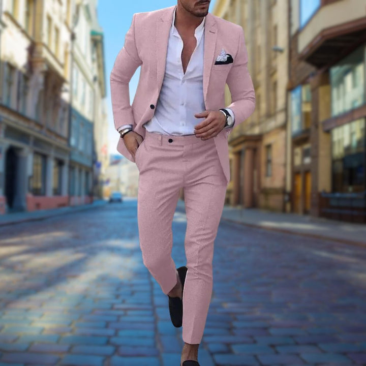 Stylish man in a modern slim fit suit, walking with confidence. Designed for all-day comfort at formal or business events.