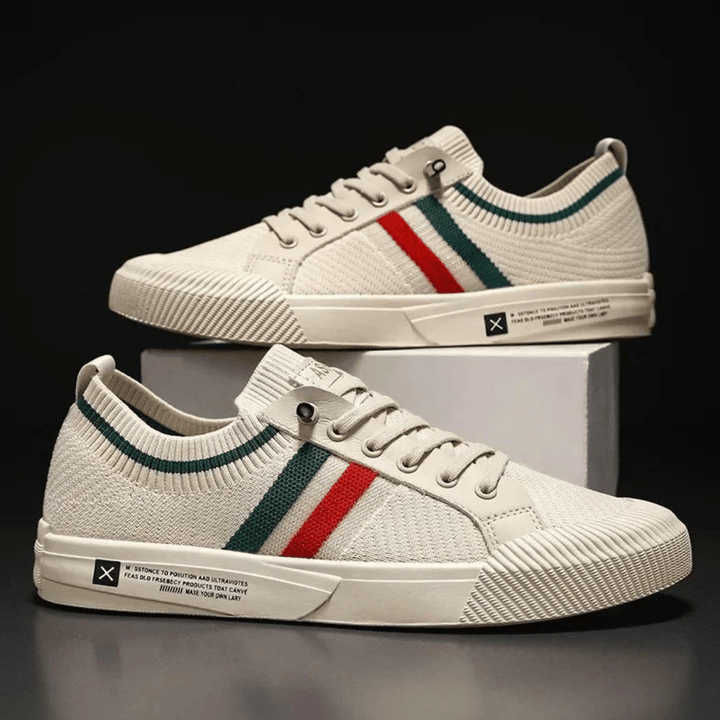 Side view of stylish men's modern street runner sneakers, designed for comfortable walking and urban casual wear.