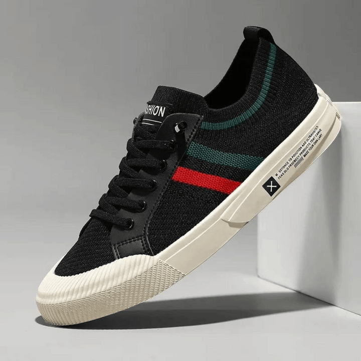 Durable rubber outsole of men's modern street runner sneakers, providing excellent grip for athletic and street wear.