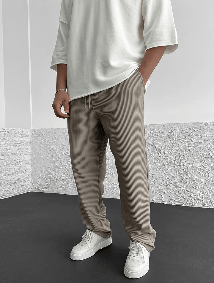 All-season men's modern style jogger pants, offering comfortable everyday wear & relaxed fit.