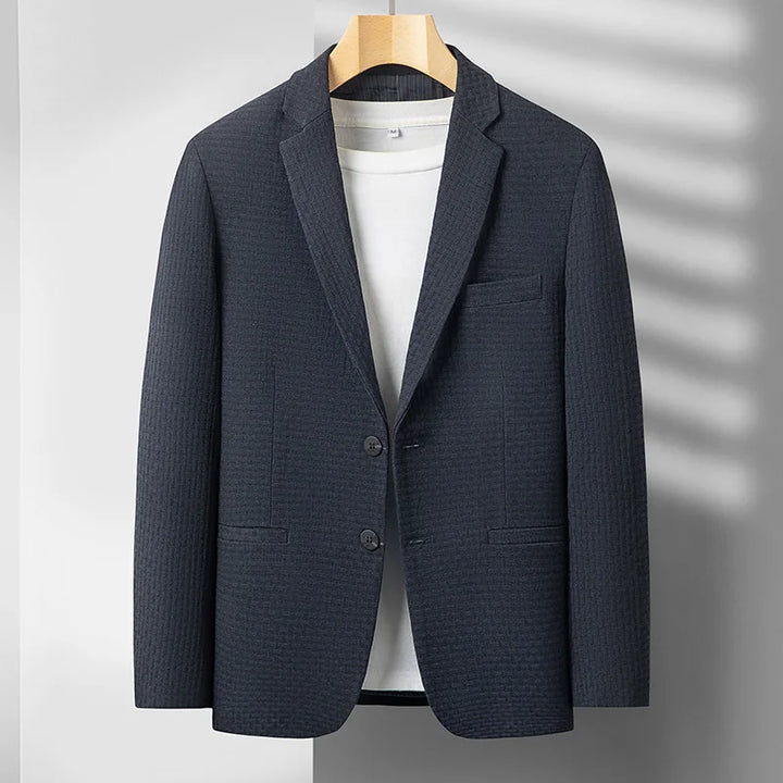 Sophisticated men's modern tailored blazer jacket, suitable for professional business wear or elevated casual ensembles.