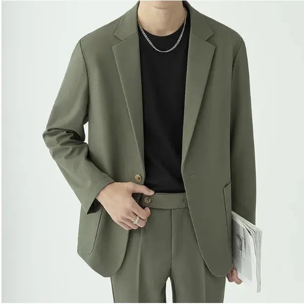 Sophisticated men's tailored suit with a modern, minimalist design, perfect for formal events.