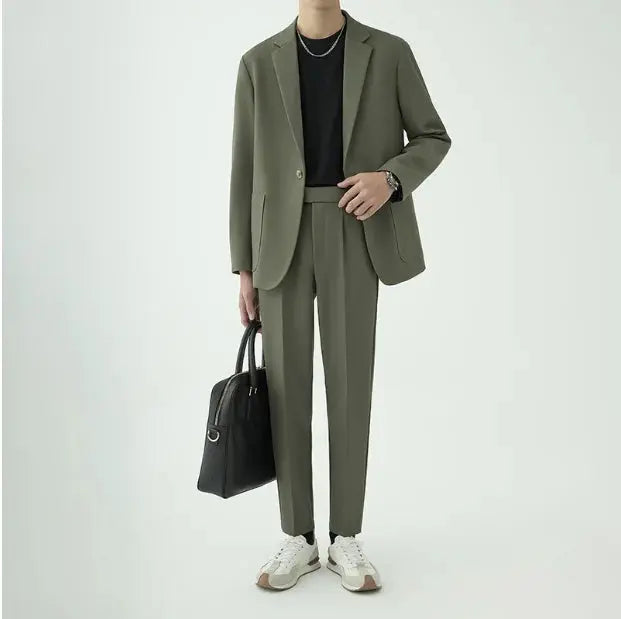 Tailored fit men's formal suit, a modern minimalist two-piece set for business and elegant occasions.