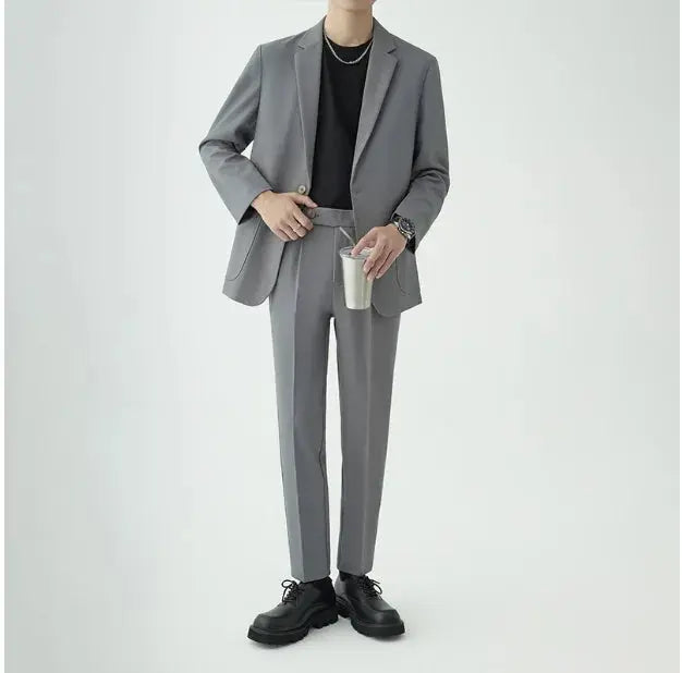 Men's fashion: modern minimalist tailored suit for sophisticated business attire and formal events.