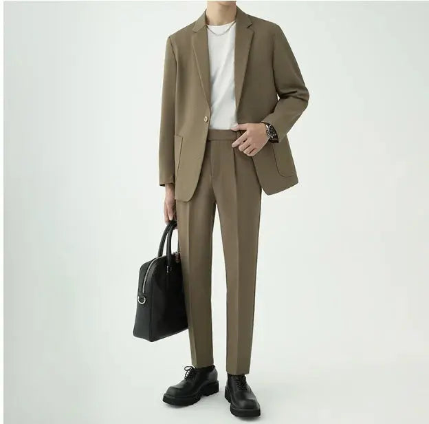 Versatile men's minimalist two-piece suit with a modern tailored fit for any formal occasion.