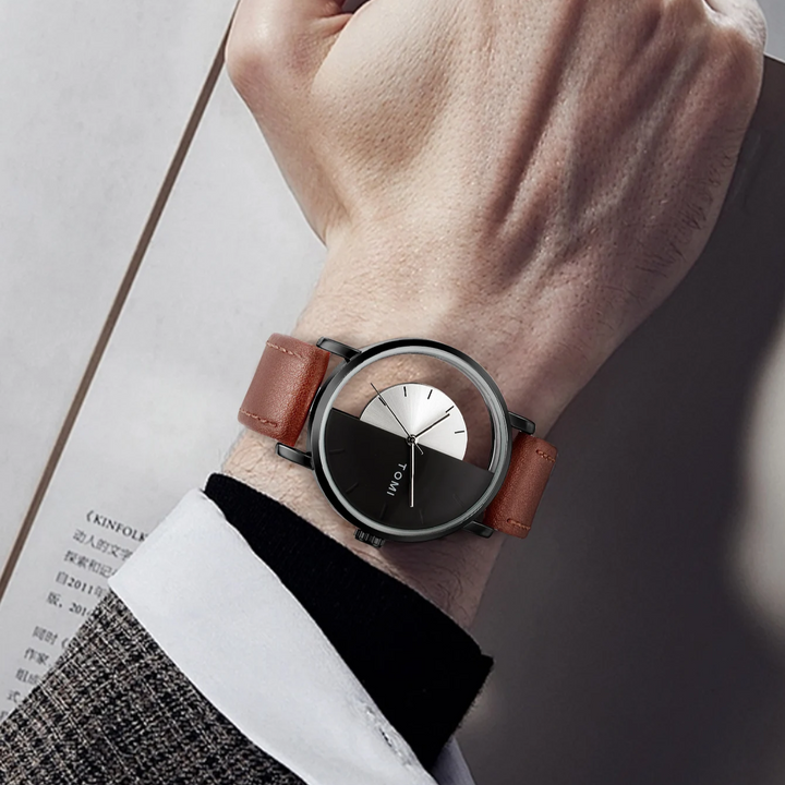 Analog men's watch, a modern statement piece with an eclipse design and leather strap.