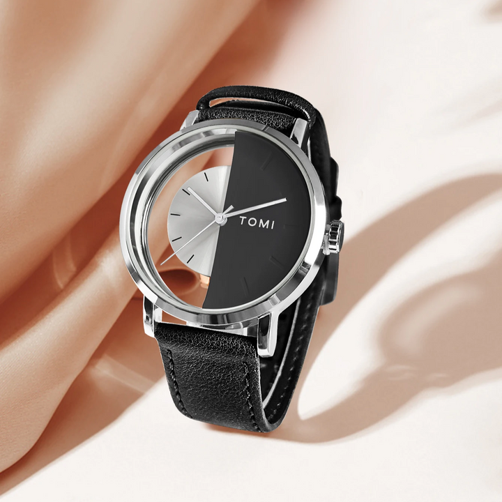 Fashionable men's watch for the modern gentleman, with an eclipse dial and leather strap.