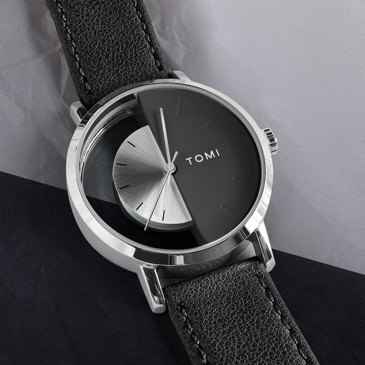 Men's statement watch combining a modern eclipse design dial with a high-quality leather strap.