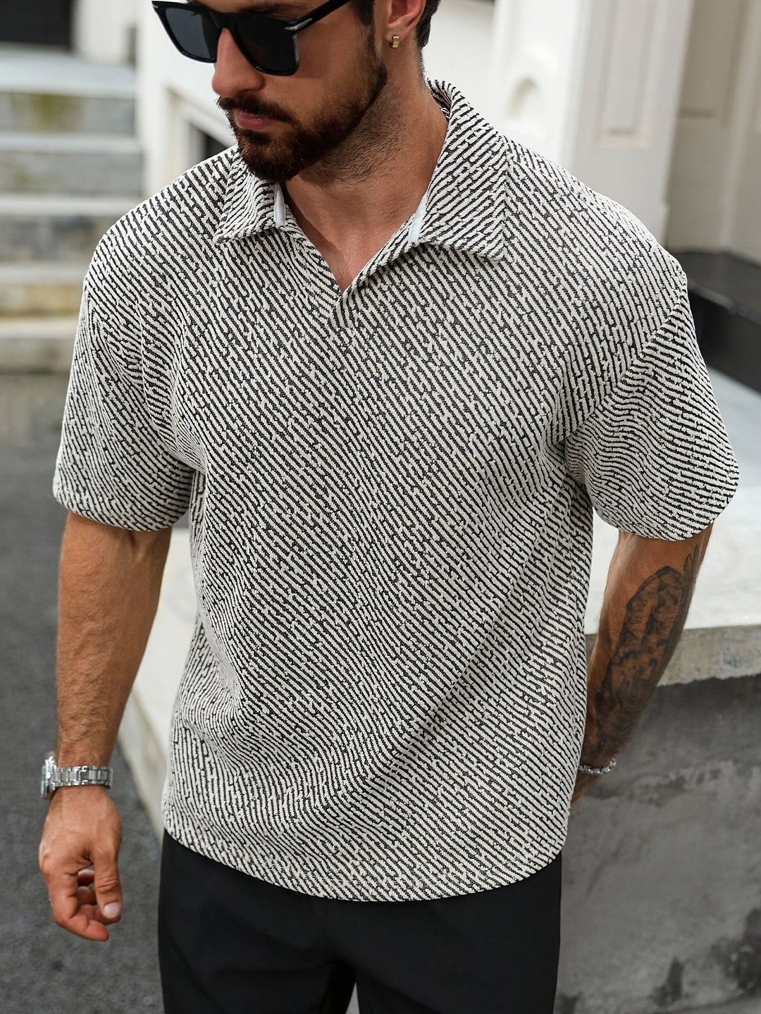 Comfortable men's summer polo shirt, textured short sleeve design for warm weather fashion.