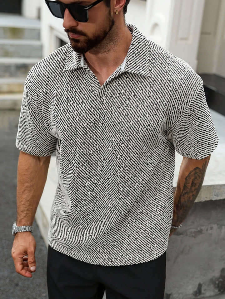 Comfortable men's summer polo shirt, textured short sleeve design for warm weather fashion.