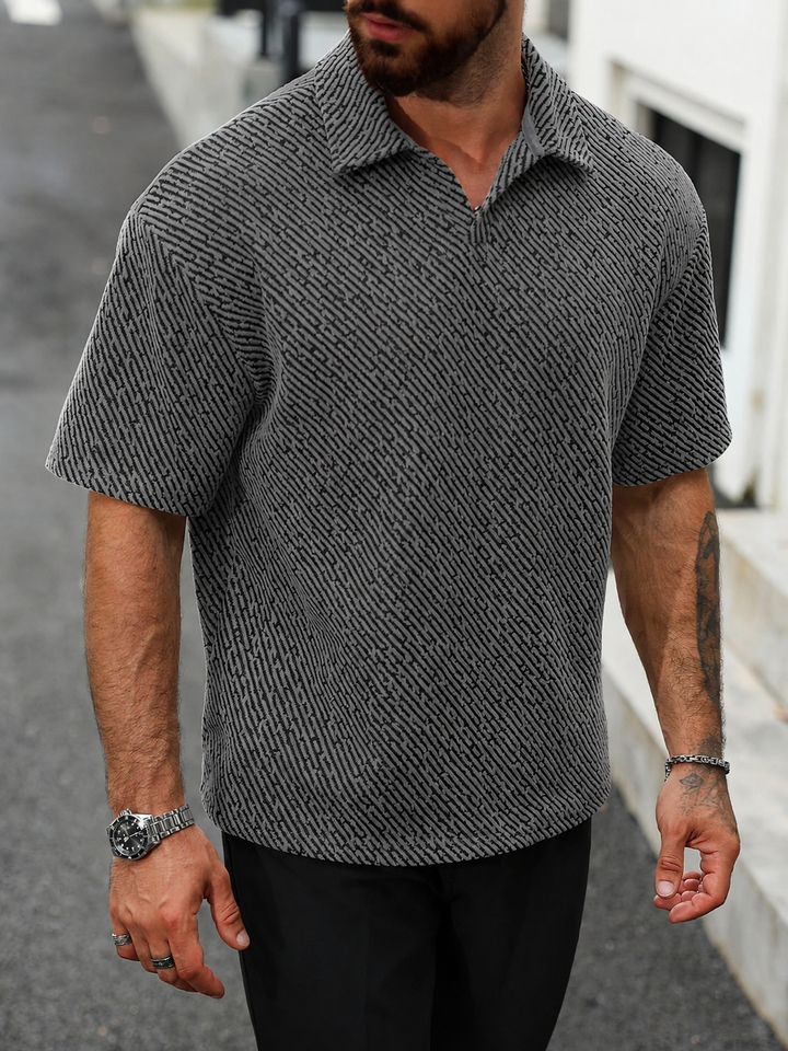 Oversized men's Monaco textured polo with drop shoulder, comfortable for stylish summer fashion.