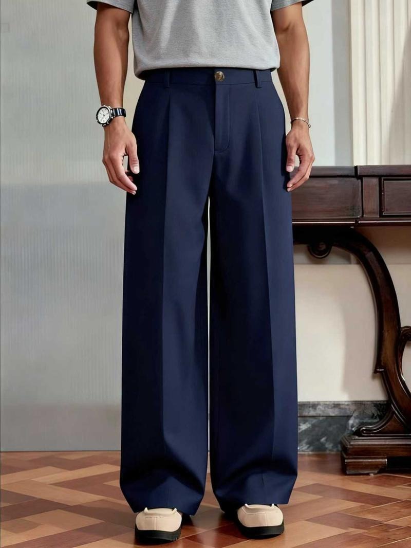 Tailored men's wide leg trousers, Monaco design, crafted from a luxurious wool blend for a modern look.