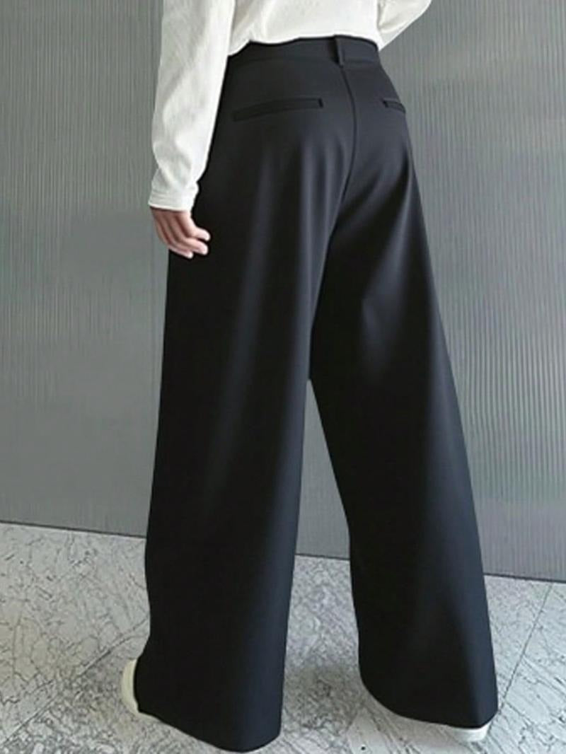 Modern men's wide leg trousers, Monaco style. Smart casual wool blend pants for contemporary men's fashion.