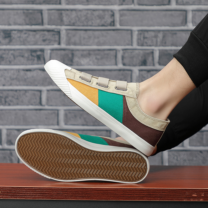 Stylish men's sneakers, impressionist design, durable sole & comfortable.