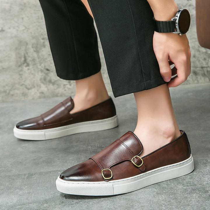 Brown men's monk strap loafers, combining timeless style with comfort for sophisticated men's footwear.