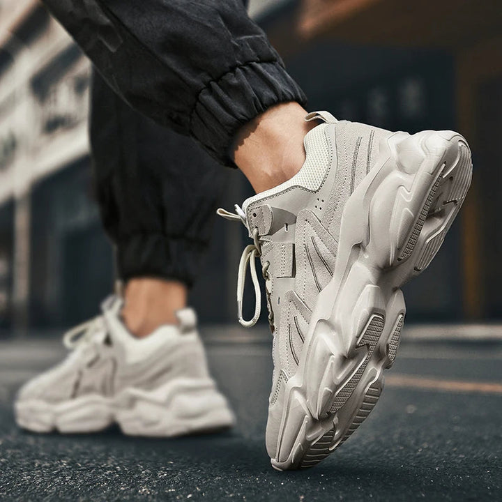 Streetwear men's Monolith chunky sneakers, black with unique sole design, elevating modern casual footwear style.