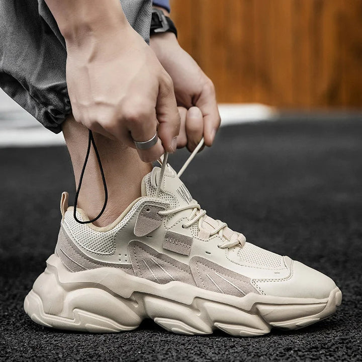 Bold men's chunky sneakers, Monolith design, black modern footwear perfect for streetwear and casual comfort.