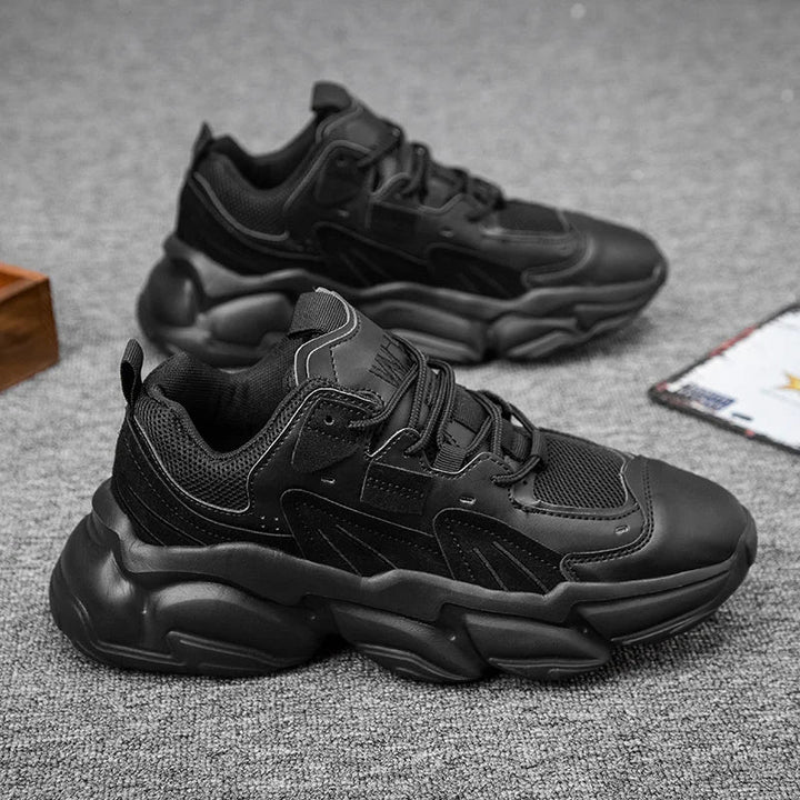 Men's black Monolith chunky sneakers, perfect for walking, modern streetwear style, comfortable & durable.