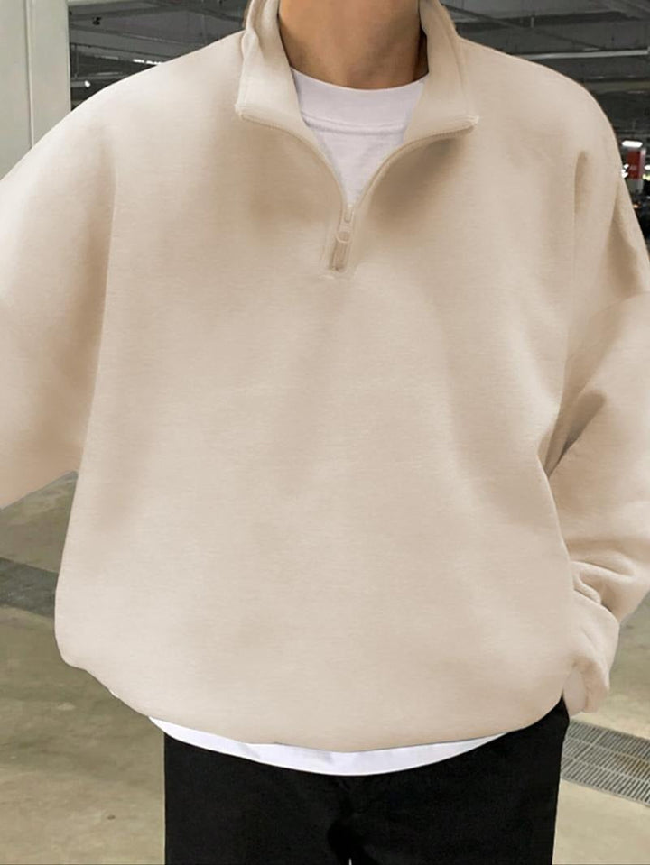 Men's Montesa half-zip sweatshirt. Modern pullover sweater in heather gray, offering comfort and style for casual wear.