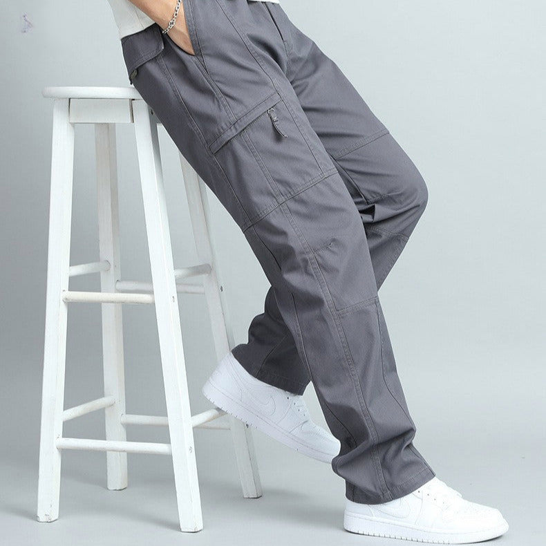 Durable men's outdoor cargo pants, featuring multiple utility pockets for tools & essentials.