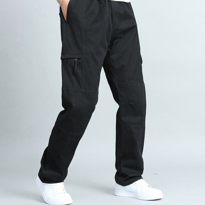 Front view of men's durable utility pants, showcasing the practical multi-pocket layout for work.