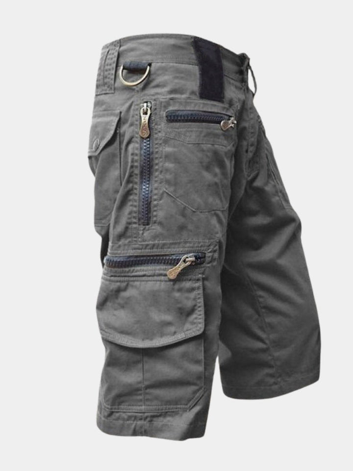 Men's multi-pocket cargo shorts, ideal for active days, travel & outdoor adventures. Comfortable utility shorts.