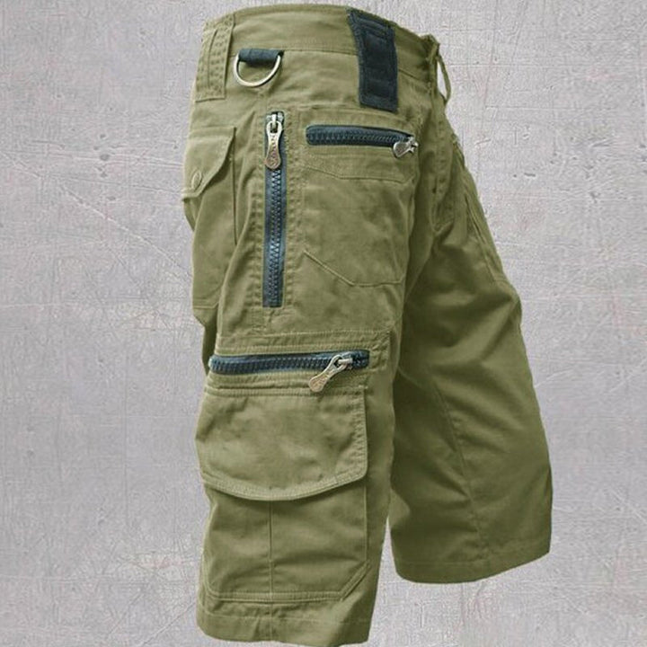 Durable men's multi-pocket cargo shorts, offering comfort and utility for outdoor, travel, and casual wear.