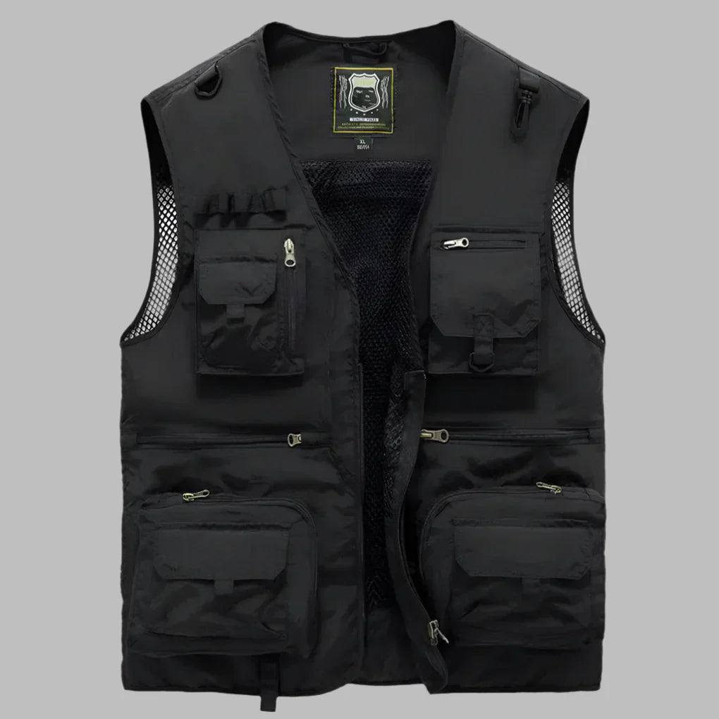 Rugged men's outdoor utility vest for adventure. Sleeveless jacket with multiple pockets, perfect for hiking.