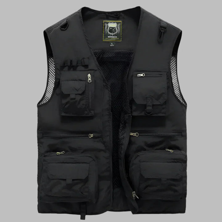 Rugged men's outdoor utility vest for adventure. Sleeveless jacket with multiple pockets, perfect for hiking.