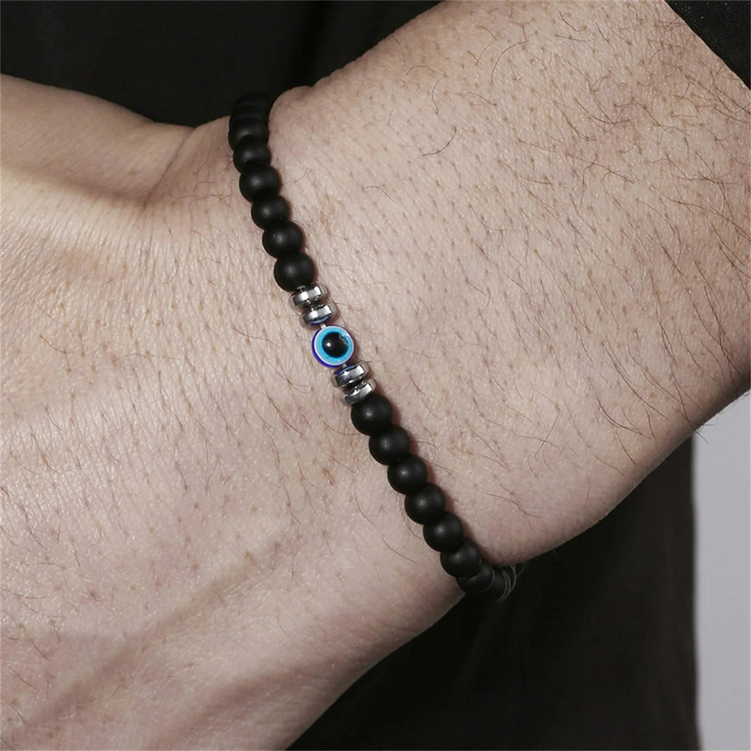 Men's natural stone evil eye protection bracelet. Spiritual jewelry with gemstone beads for energy.
