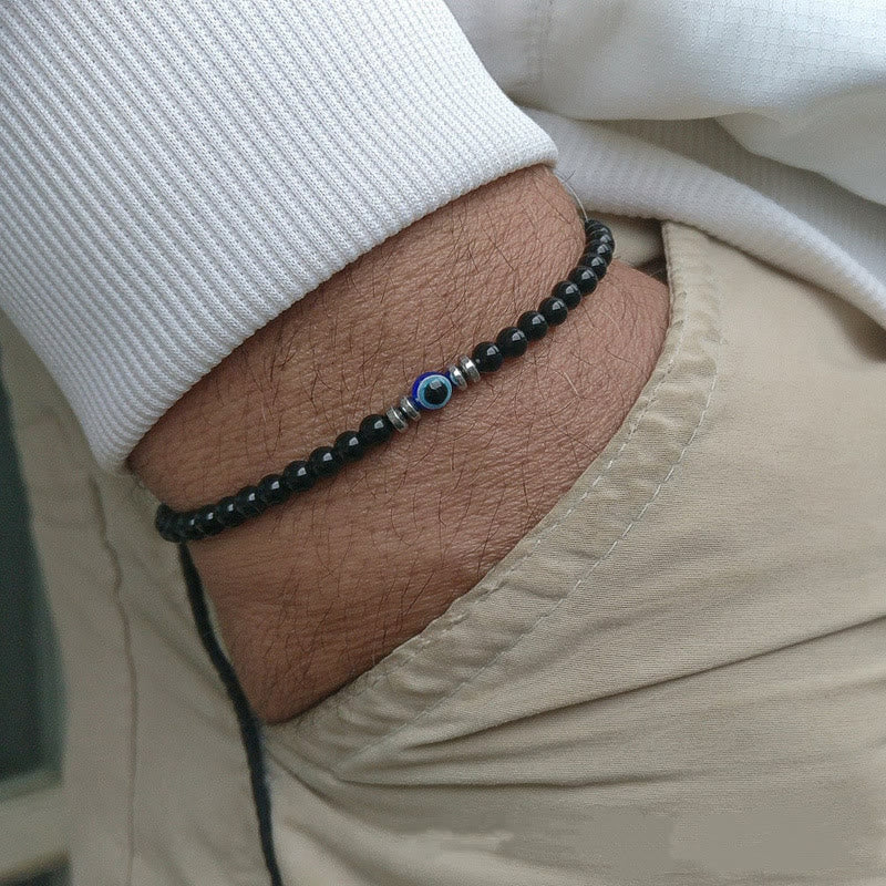 Adjustable men's natural stone evil eye protection bracelet. Spiritual jewelry, unique style.