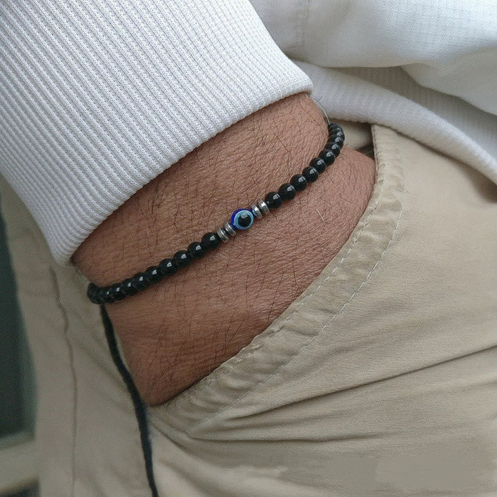 Adjustable men's natural stone evil eye protection bracelet. Spiritual jewelry, unique style.