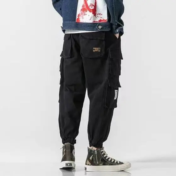 Front view of men's Navigator Cargo Joggers, showcasing utility design, tapered leg, and comfortable fit.