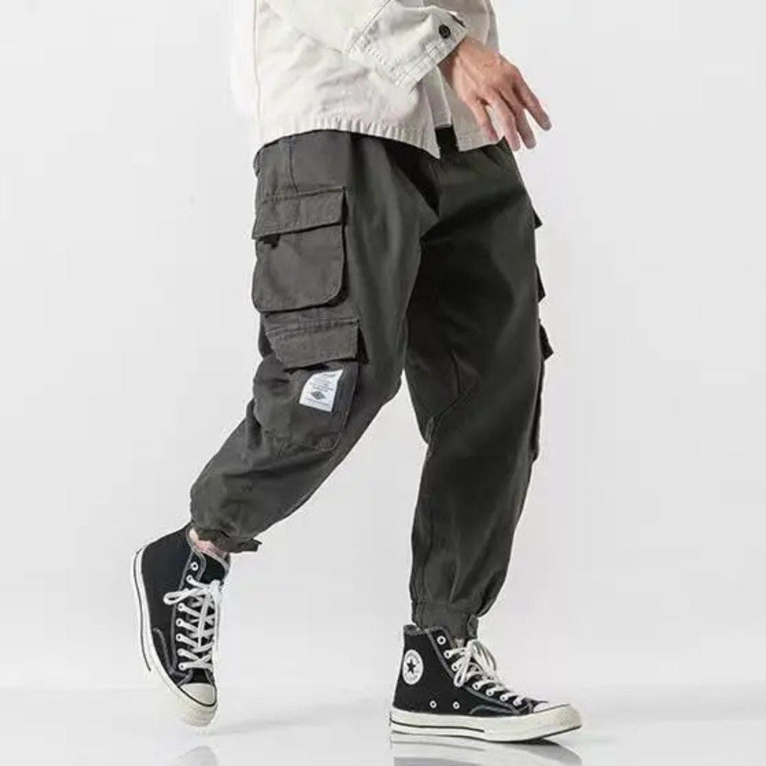 Modern men's tapered cargo jogger pants, combining utility design with casual style & comfort.