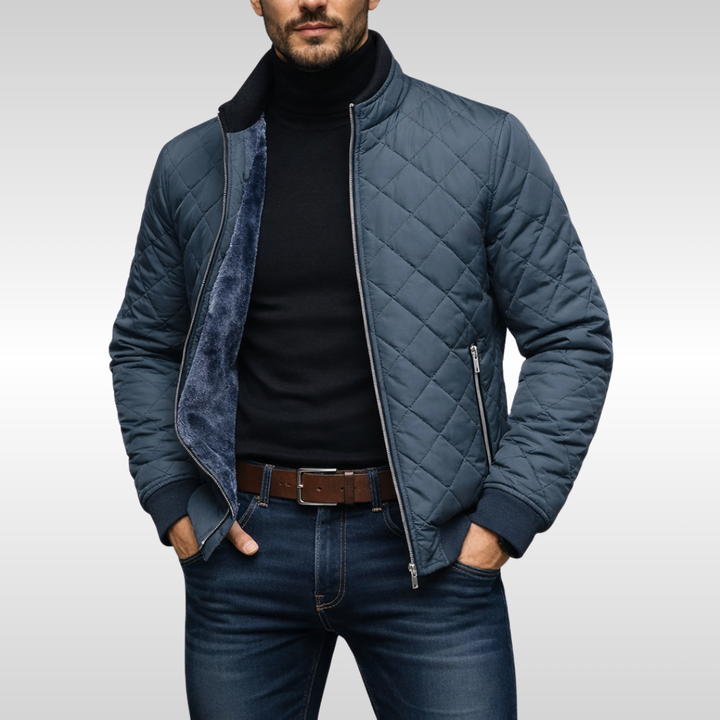 Stylish black men's quilted jacket, perfect for cooler weather. Comfortable, lightweight fall/winter outerwear.