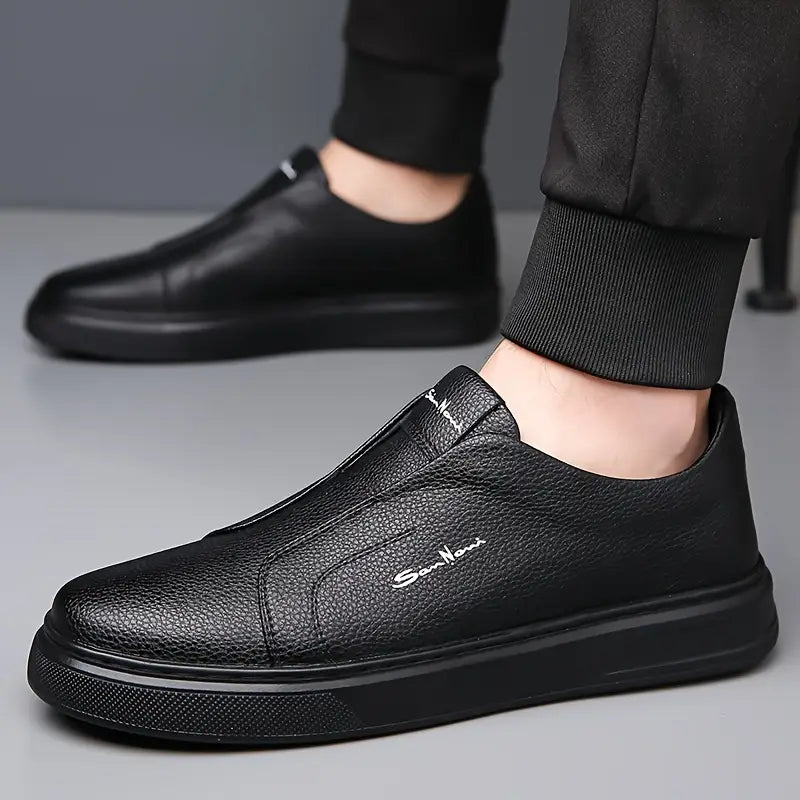 A pair of men's comfortable Shoreline slip-on sneakers, perfect for versatile everyday casual style.