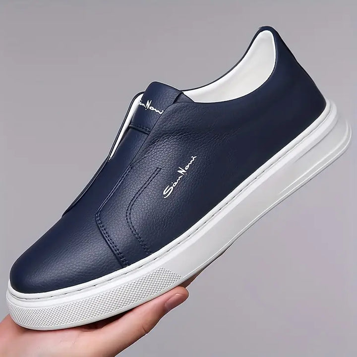 Stylish brown men's casual slip-on sneakers, designed for ultimate comfort and easy wear.
