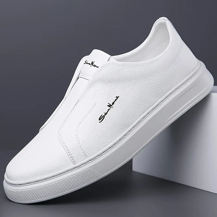 Side view of men's casual slip-on sneakers, showcasing sleek design and comfortable fit.