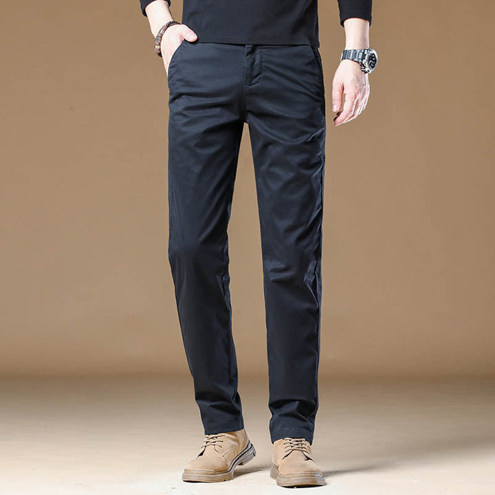 Professional men's slim fit office pants. Tailored for business casual and all-day comfort. Wrinkle-resistant dress pants.
