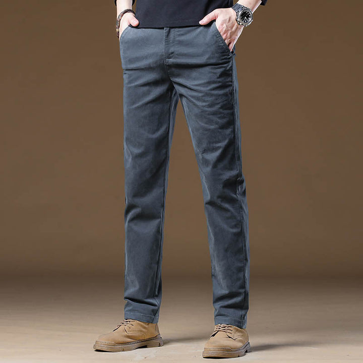 Stylish men's slim fit blue office pants. Professional tailored design, wrinkle-resistant for sharp business casual attire.