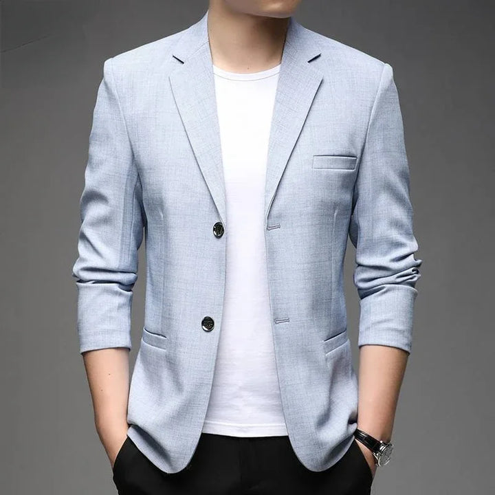 Men's navy structured blazer, tailored for sharp professional style. Ideal for business casual or formal events.