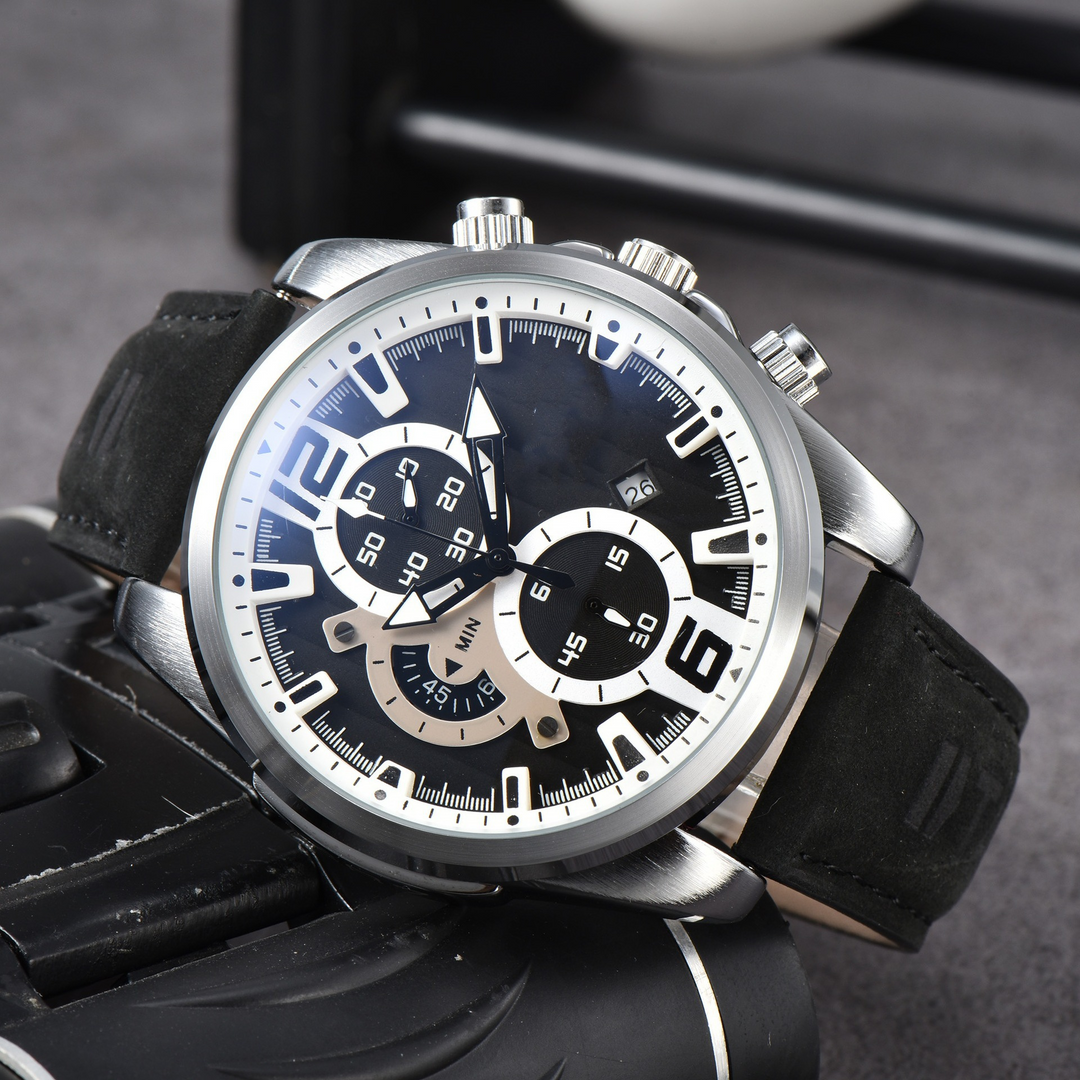 Men's Nexus Chrono Watch, stainless steel case, black leather strap, and date display.