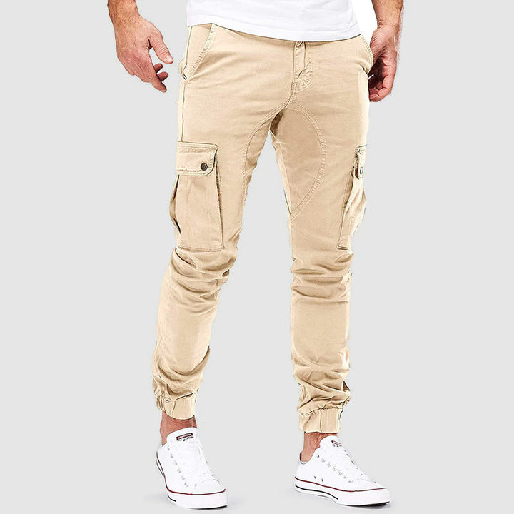 Stylish men's slim-fit cargo pants in Nolan style with multiple pockets, perfect for modern casual fashion.