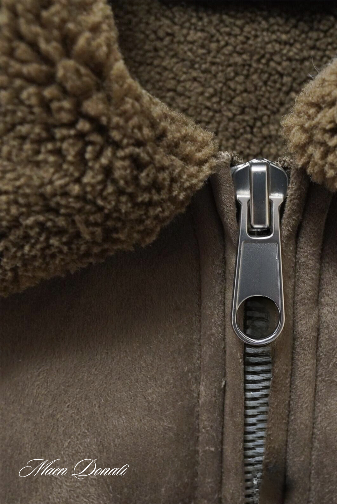 Warm winter bomber jacket for men, Nolan style, with ribbed cuffs & a sleek look.